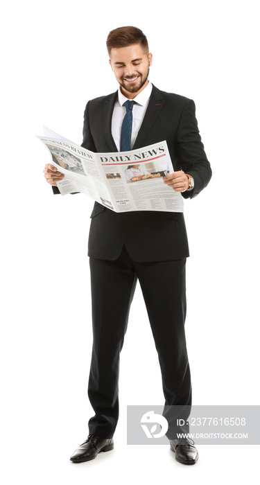 Handsome businessman with newspaper on white background