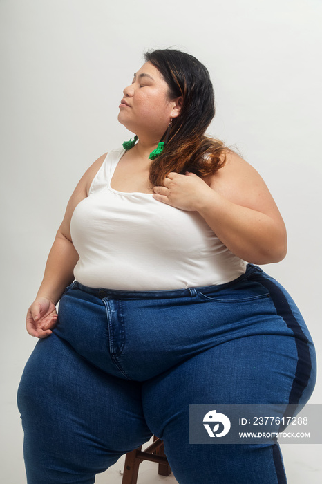 Asian plus size female solo lifestyle studio portrait shot