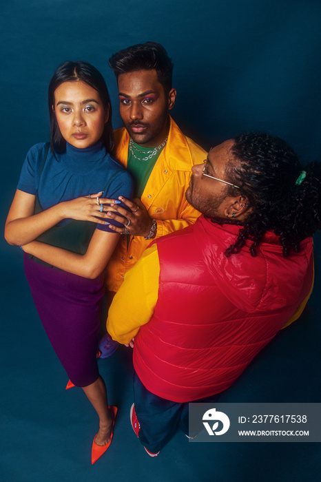 Asian trio colour blocked fashion studio portrait