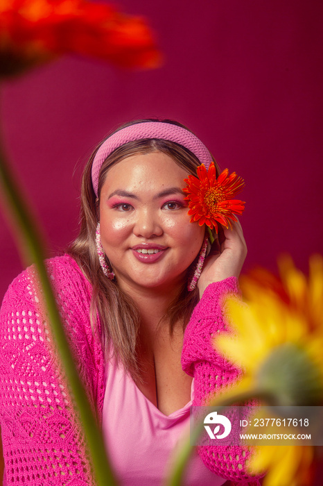 Asian individual fashion colour-blocked studio portrait