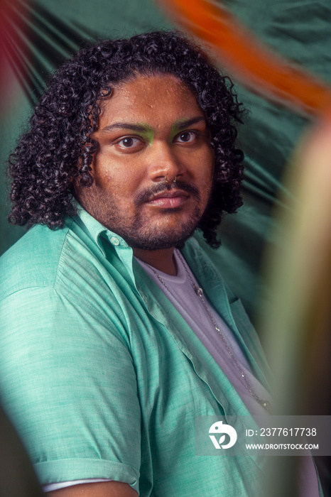 South Asian male colour blocked fashion studio portrait