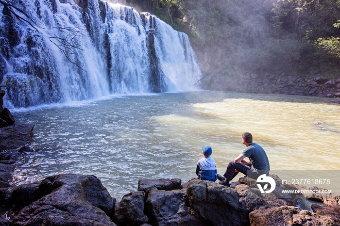 family enjoying waterfalls