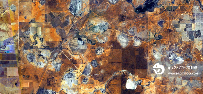 abstract landscape photo of the deserts of Africa from the air emulating the shapes and colors of after the battle, Genre: Abstract naturalism, from the abstract to the figurative