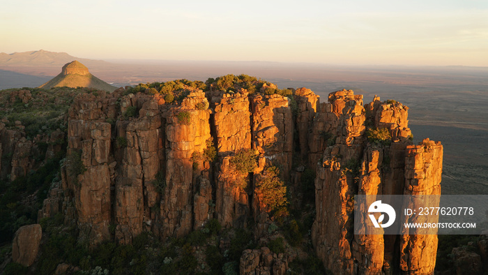 Valley of Desolation Rock Formations and hills during sunset near Graaff Reinet in South Africa.