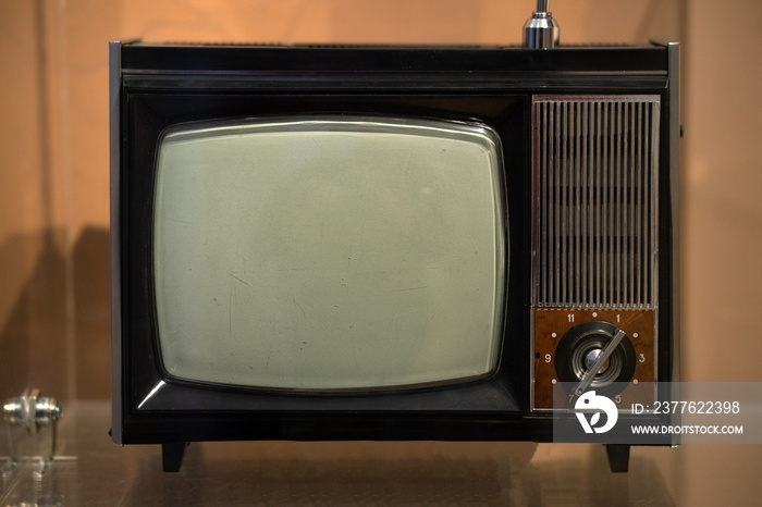 An old square-shaped tube TV. The TV is from the old model.
