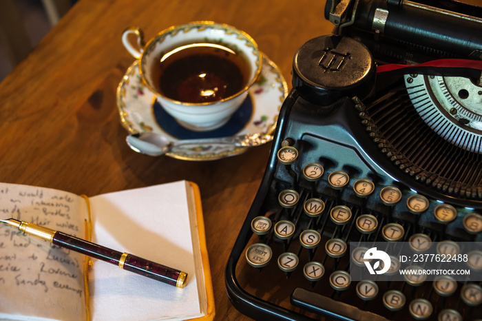 vintage typewriter and cup