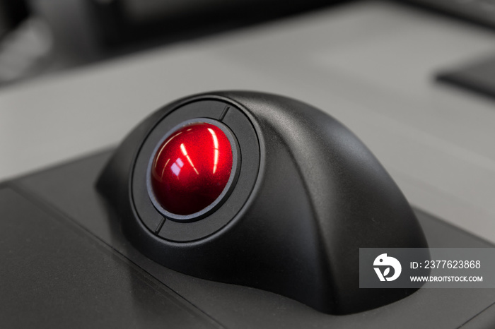 Red trackball, close up photo