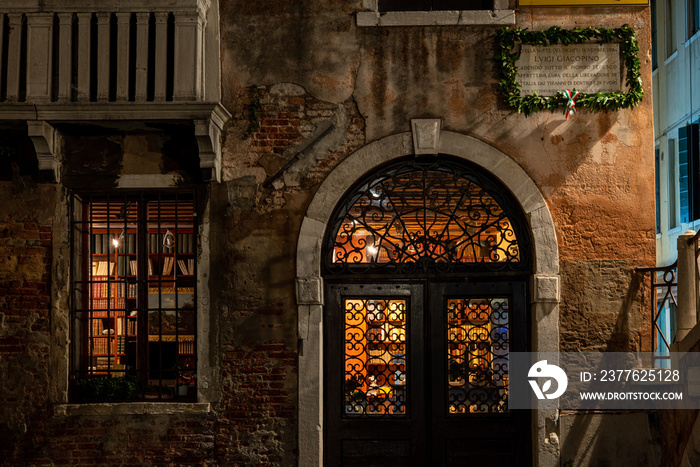 An old Book Store illuminated at Night, Venice/Italy