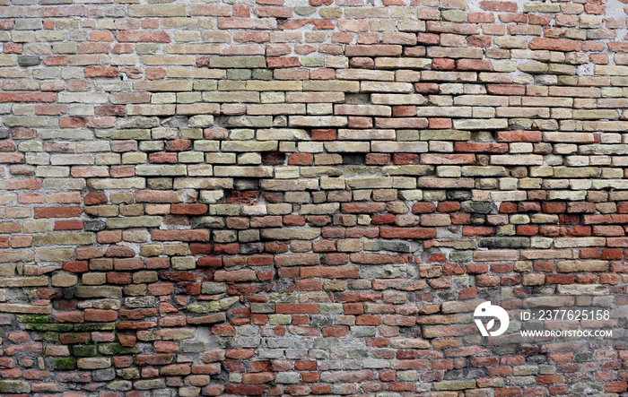 old red bricks on the ancient wall