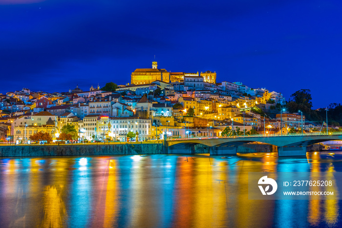 Night view of cityscape of old town of Coimbra, Portugal