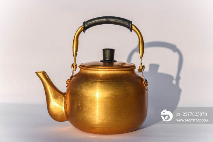 Copper desert tea pot, antique metal teapot isolated on white background, antique kettle, golden teapot, metal teapot, Chinese teapot on white background, antique teapot, golden teapot, metal kettle.