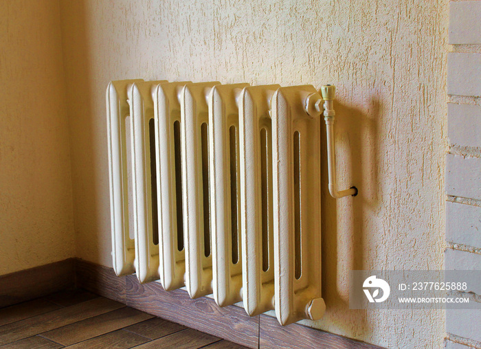 Cast iron radiator vintage on wall