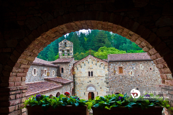 Framed View of Courtyard Walls Through Archway With Flowers at an Italian Style Castle in Napa Valley,Calistoga, California, USA