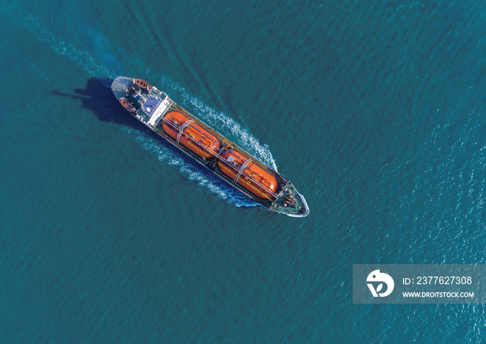 Aerial top view Ship tanker oil or gas LPG full speed for transportation oil from refinery.