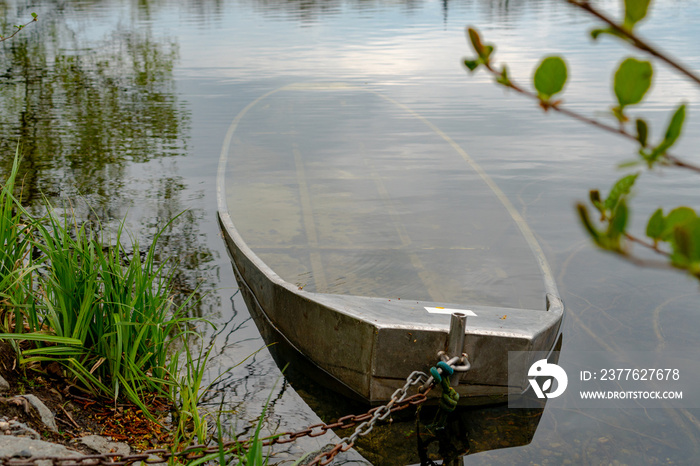 Sunken boat ship in a lake