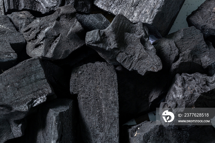 Macro charcoal background,charcoal,BBQ grill coal top view. Black charcoal texture background.