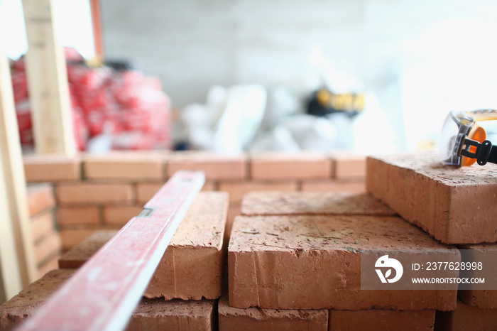 Blocks placed on unfinished structure, renovation in new apartment