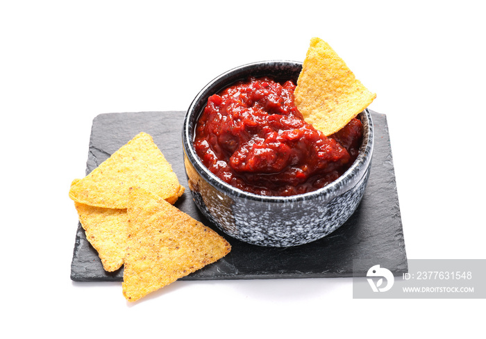 Bowl of chili sauce with nachos on white background