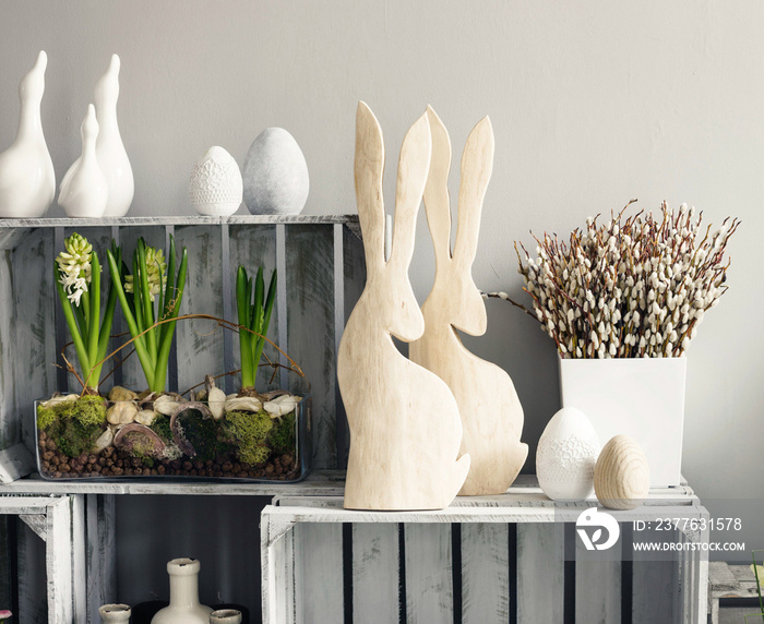 Simple, modern Easter decoration with hyacinth bulbs and pussy willows