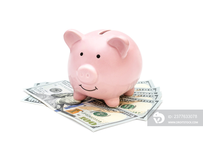 Piggy bank with money on white background.