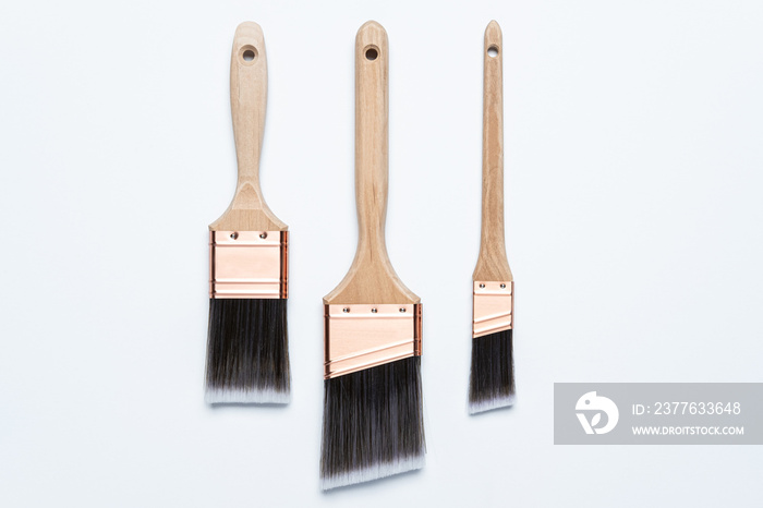 Photograph of professional grade paint brush set , 1 , 2  and 2.5  brush on white background