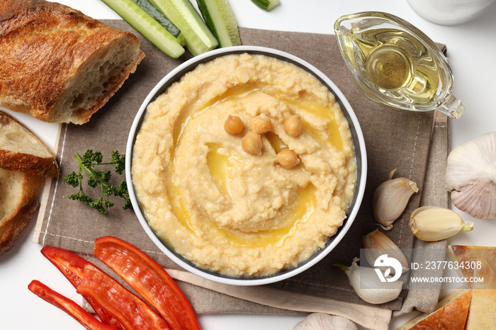 Concept of tasty food with hummus, top view