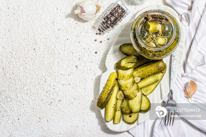 Pickled cucumbers for winter organic food. Jar of homemade gherkins, clean eating, vegan concept