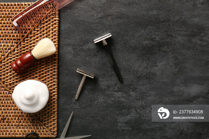 Male accessories for shaving on black background