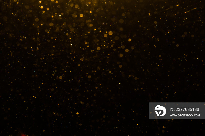 Abstract gold bokeh with black