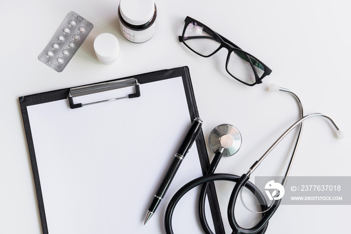 Stethoscope with clipboard and medicine, Top view, copy space, Healthcare concept