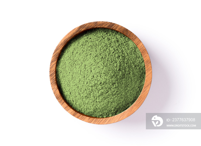 Green herbal protein powder in wooden bowl isolated on white background. Clipping path. Top view. Flat lay.