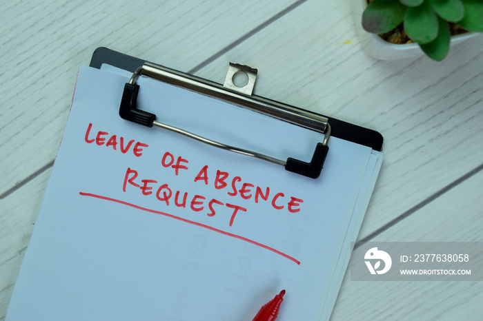 Concept of Leave of Absence Request write on paperwork isolated on Wooden Table.