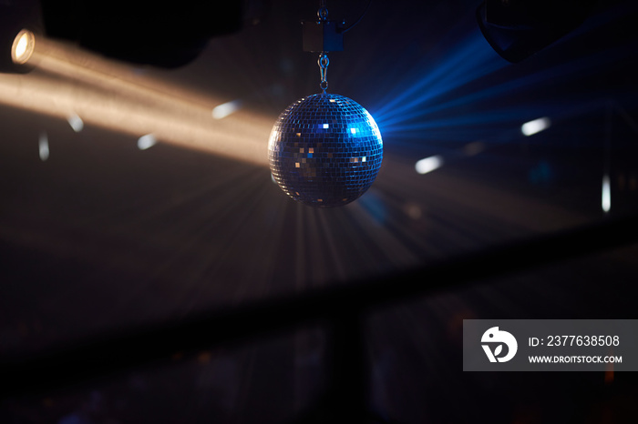 disco ball. disco ball background close up. Party disco mirror ball reflecting blue color lights