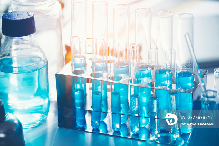 Test tube of glass overflows new liquid solution potassium blue conducts an analysis reaction takes various versions reagents using chemical pharmaceutics cancer manufacturing