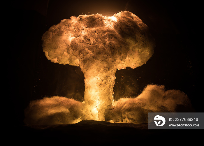 Nuclear war concept. Explosion of nuclear bomb. Creative artwork decoration in dark.