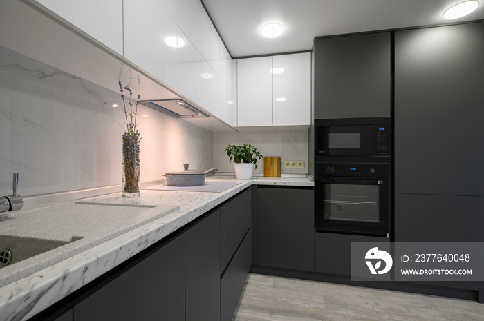 Modern simple trendy dark grey and white kitchen