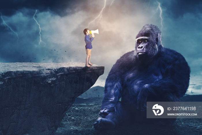 Child shouting at a big gorilla through a megaphone