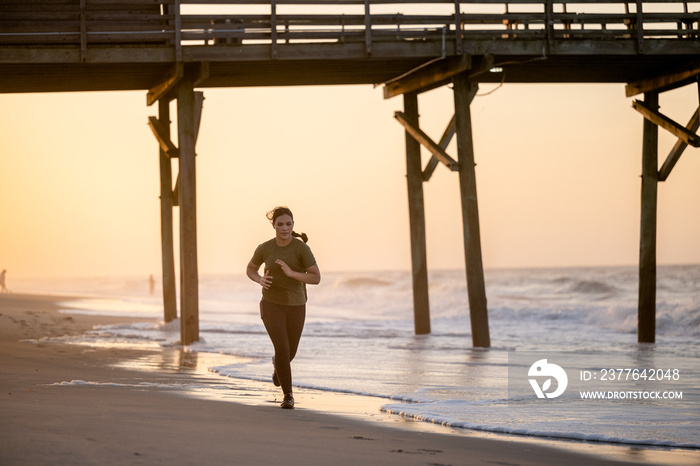 Marine veteran trains every morning on the beach to stay in shape just like when she was on active duty.