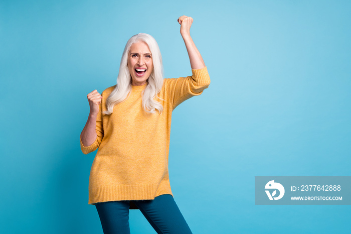 Portrait of her she nice attractive lovely pretty cheerful cheery ecstatic lucky grey-haired woman celebrating attainment isolated over bright vivid shine vibrant blue color background