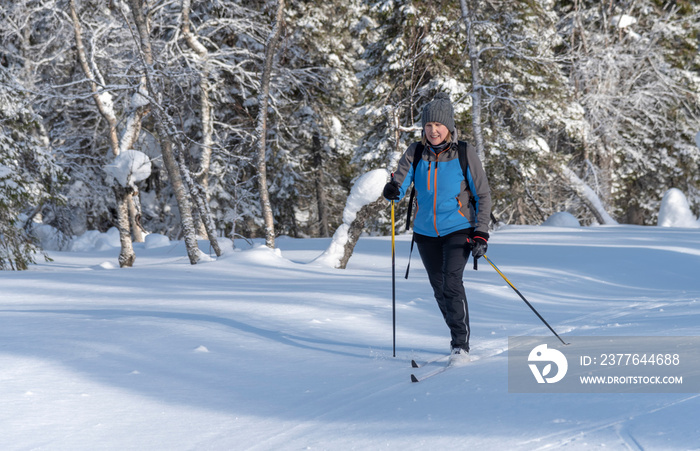 Woman cross country skiing