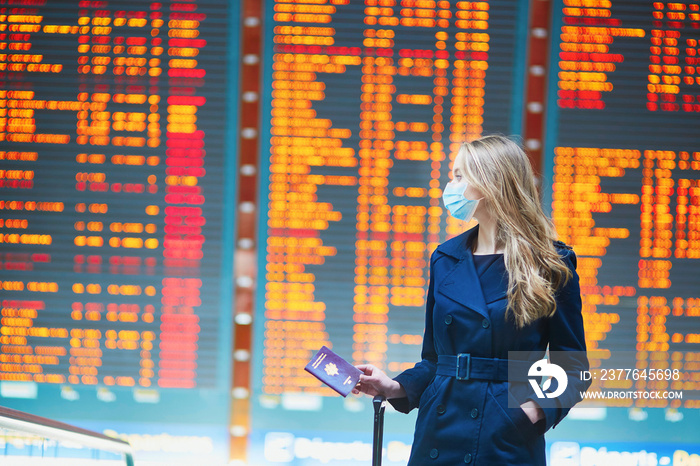 Young female traveler in international airport