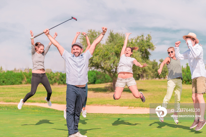 Young group celebration happily on a golf