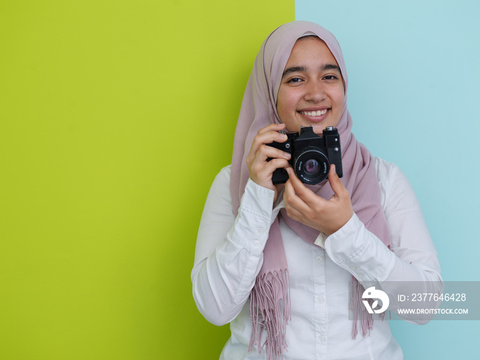 Arab young woman photographer with  camera