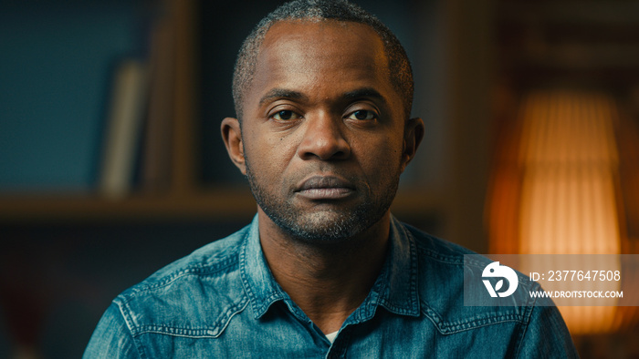 Close-up male portrait serious sad lonely mature african american man looking at camera desperate unhappy hopeless middle-aged ethnic businessman posing indoors crisis problem concept moving footage