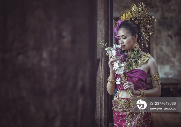 Beautiful Thai woman in Traditional Thai dress