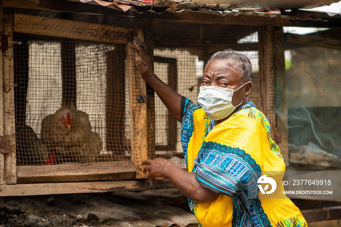 image of old african woman with face mask- protection concept