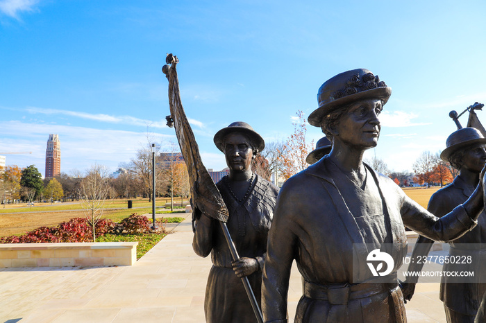 a shot of the copper statues at the Tennessee Woman’s Suffrage Monument at Centennial Park in Nashville Tennessee USA