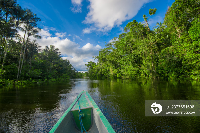 Travelling by boat into the depth of Amazon Jungles in Cuyabeno National Park, Ecuador