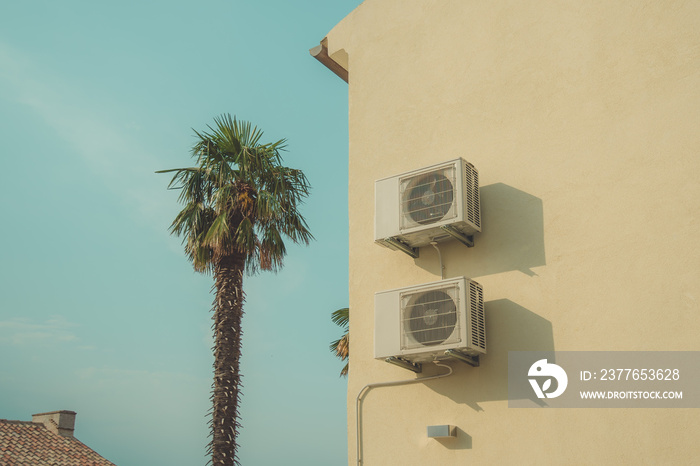 Air conditioner external unit mounted on the wall of mediterranean house in Croatia