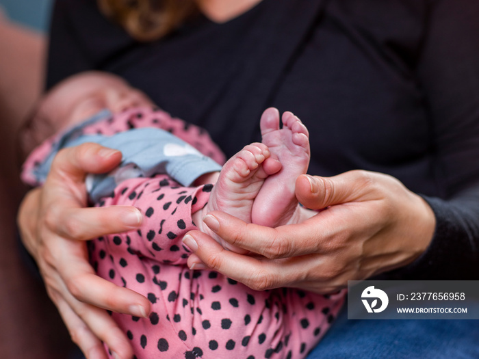 Close-up of woman holding baby son